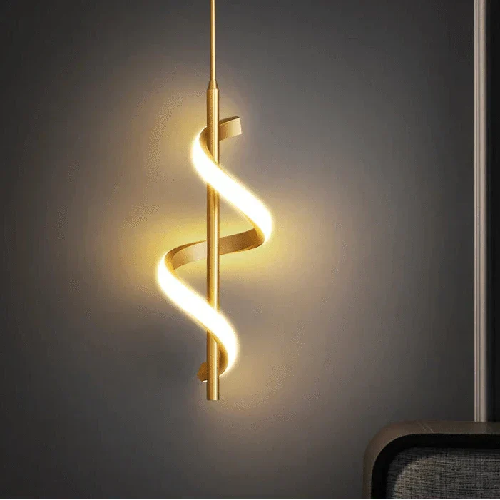 Modern LED wall sconce with adjustable gold arm and copper finish, ideal for ambient lighting in living rooms and bedrooms.