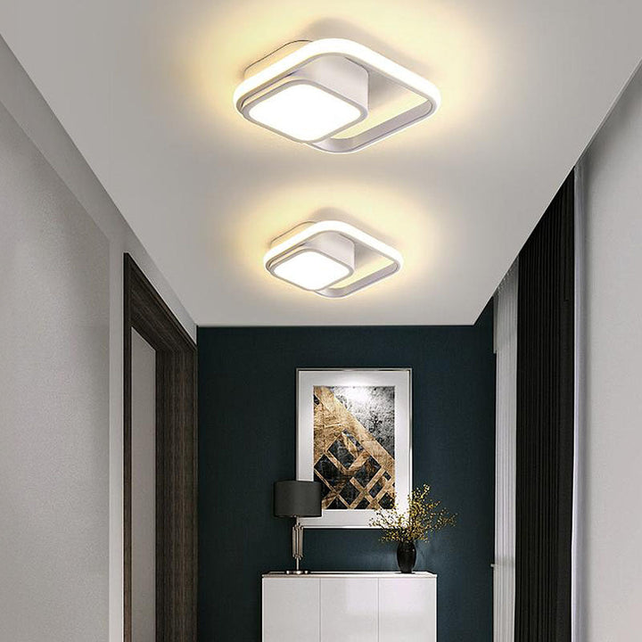 "Modern Minimalist Halo Duo Ceiling Light with a sleek, circular design providing warm, ambient LED illumination."