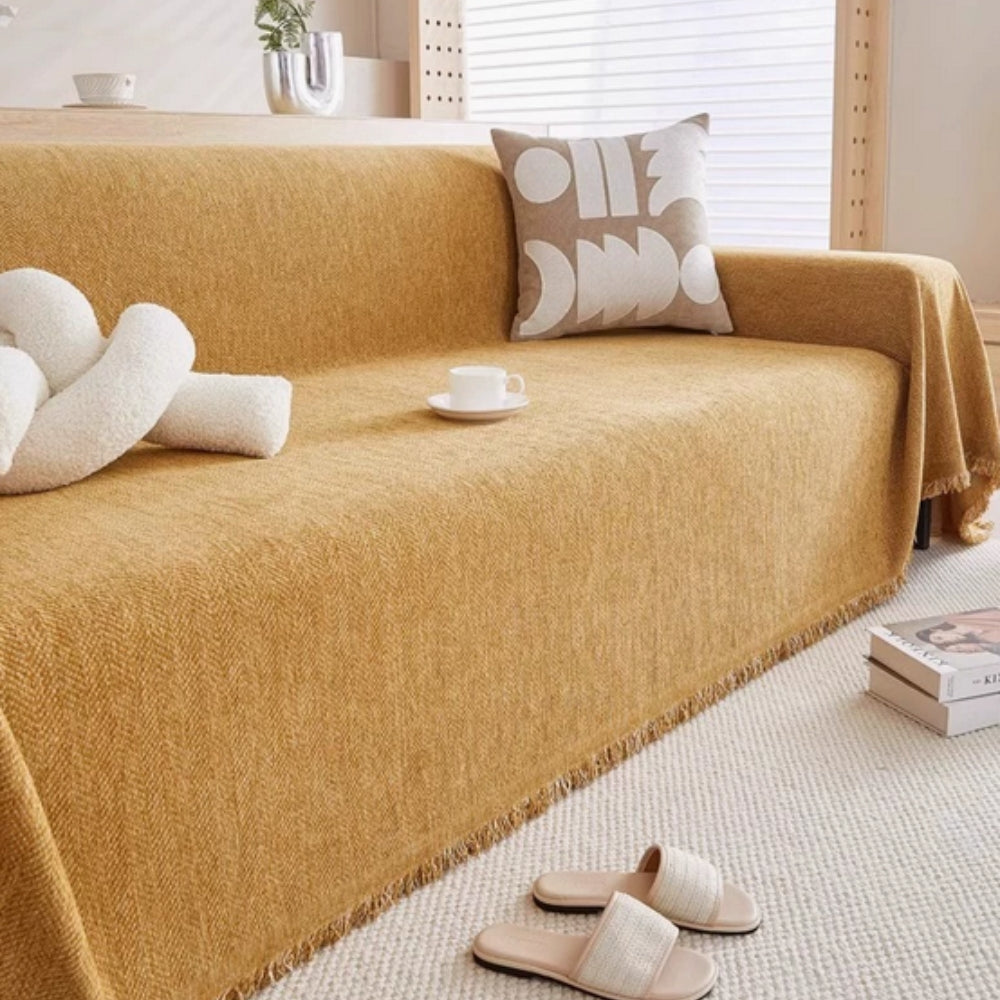 Soft, easy-care minimalist couch blanket, ideal for modern living room comfort & stylish sofa protection.