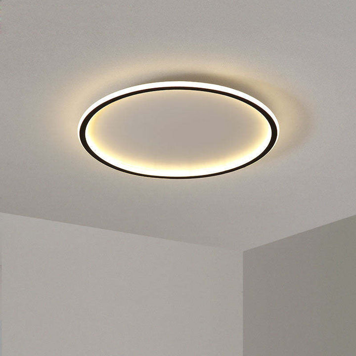 "Modern Nordic LED Ceiling Light with minimalist round flush mount design, providing soft even illumination for modern interi