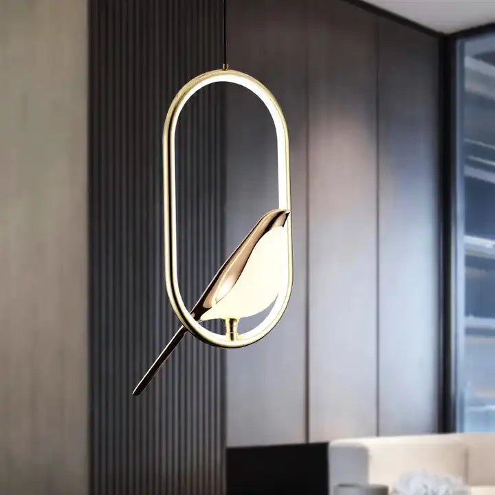"Modern pendant light with elegant golden bird design in a minimalist frame, ideal for serene home environments."
