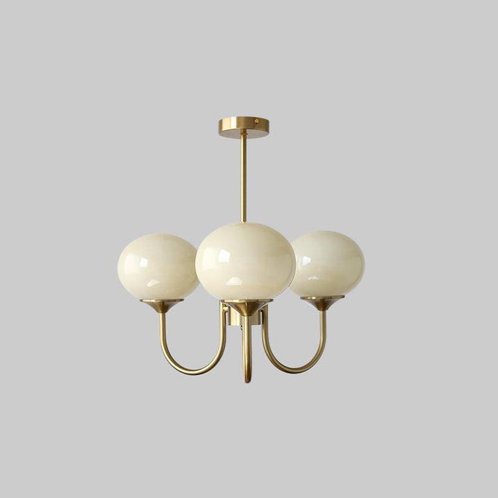Modern pink and gold chandelier with elegant glass shades, ideal ceiling light fixture for chic home decor and illumination.