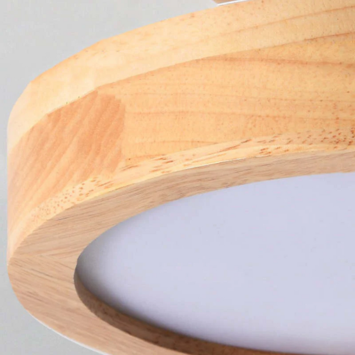 Adjustable modern round LED light, Nova, enhancing any bedroom or dining room.