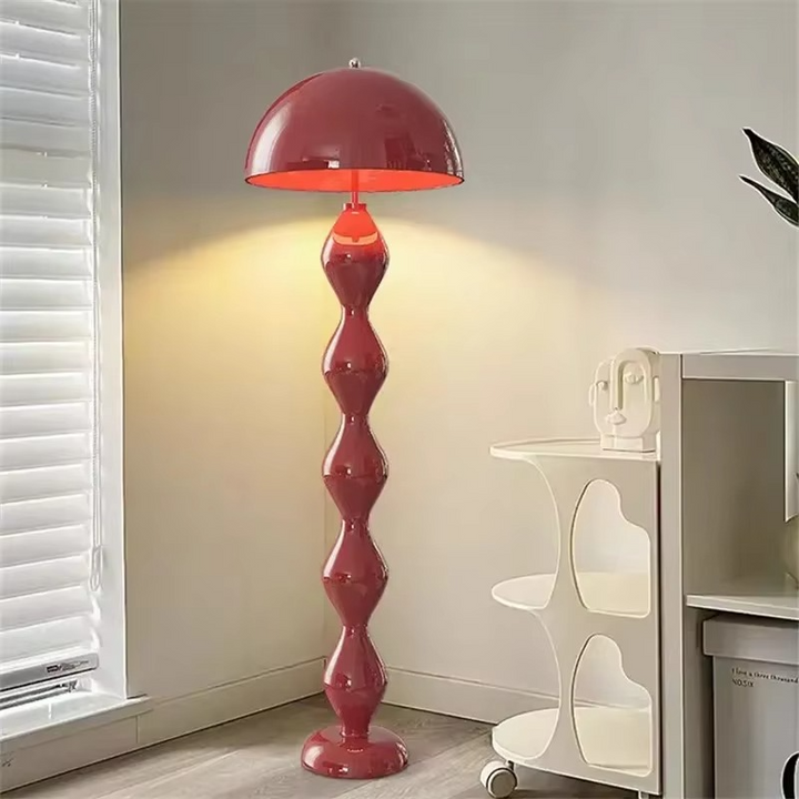 "Modern Scandinavian floor lamp with sleek metal frame and glowing shade in minimalist design for contemporary home decor."