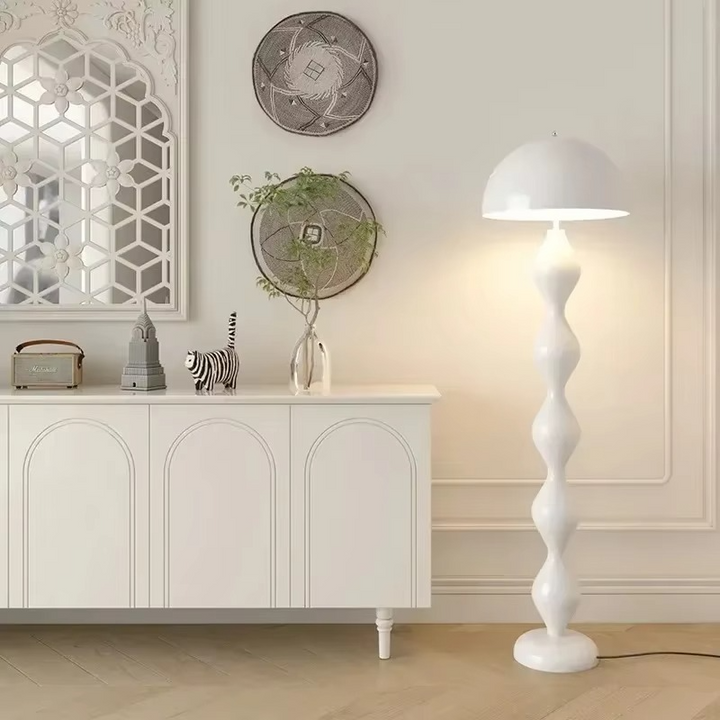 "Modern Scandinavian floor lamp with sleek metal frame and glowing shade in minimalist design for contemporary home decor."