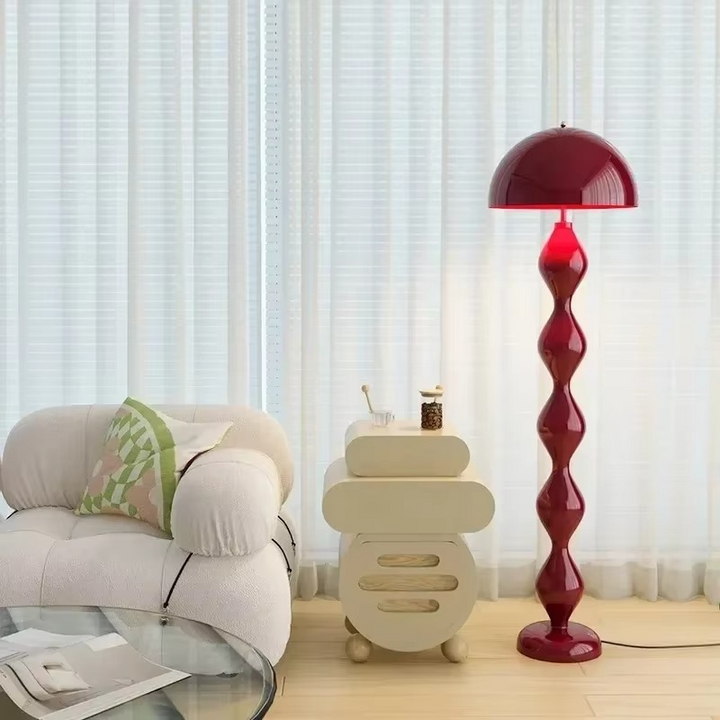 "Modern Scandinavian floor lamp with sleek metal frame and glowing shade in minimalist design for contemporary home decor."