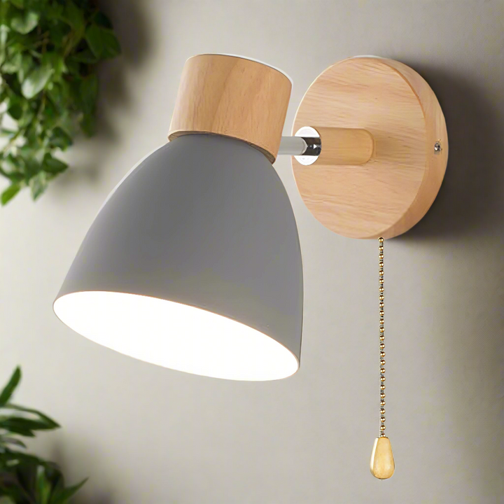 Modern Scandinavian wall light, natural wood frame, metal accents, pull switch, emits soft glow, fits minimalist decor.