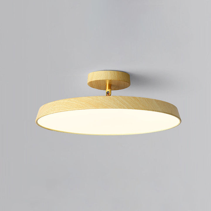 "Modern semi-flush ceiling light with sleek design, adjustable tones, and energy-efficient LED, perfect for any room ambiance