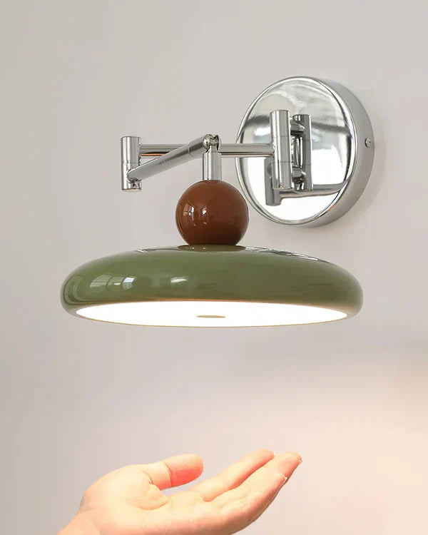 "Modern swing arm wall lamp with adjustable metal arm, acrylic base, integrated LED, beige and green color options."