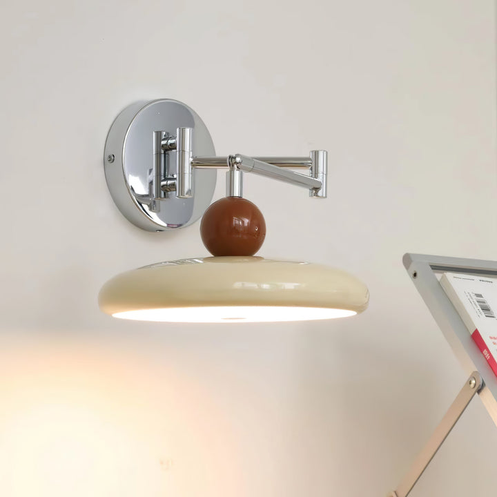 "Modern swing arm wall lamp with adjustable metal arm, acrylic base, integrated LED, beige and green color options."