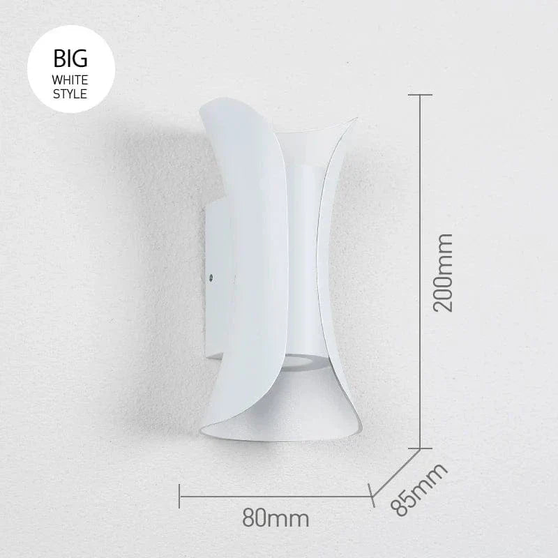Modern waterproof LED wall light, sleek aluminium, IP65 rating, indoor/outdoor use, warm white glow, available in black.