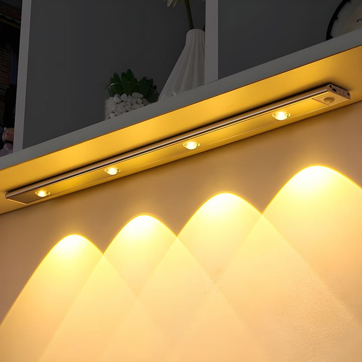 "Motion Sensor LED Light Fixture, wireless, adjustable, sleek design in black, perfect for lighting hallways and living rooms