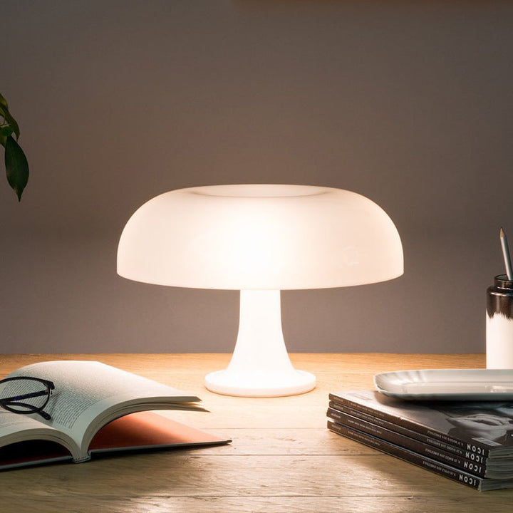 "Mushroom-shaped minimalist table lamp with LED, Nordic design, in white and orange; perfect for modern interiors."