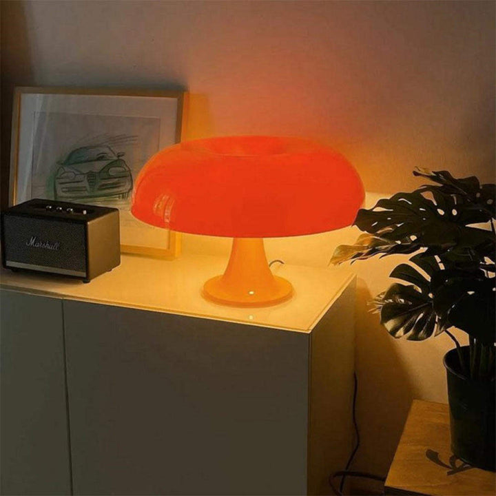 "Mushroom-shaped minimalist table lamp with LED, Nordic design, in white and orange; perfect for modern interiors."