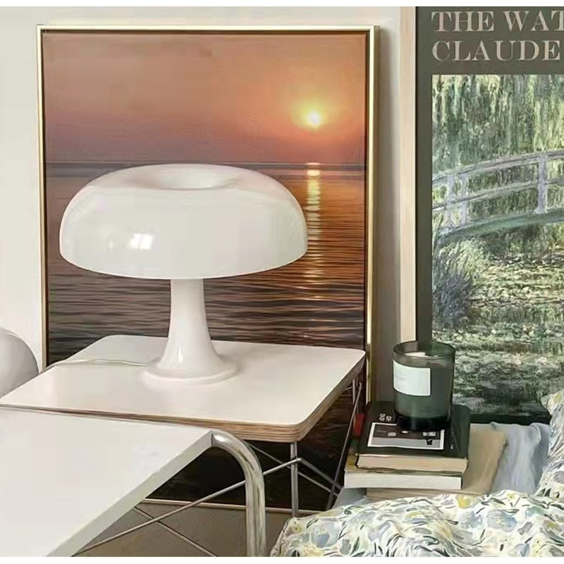 "Mushroom-shaped minimalist table lamp with LED, Nordic design, in white and orange; perfect for modern interiors."