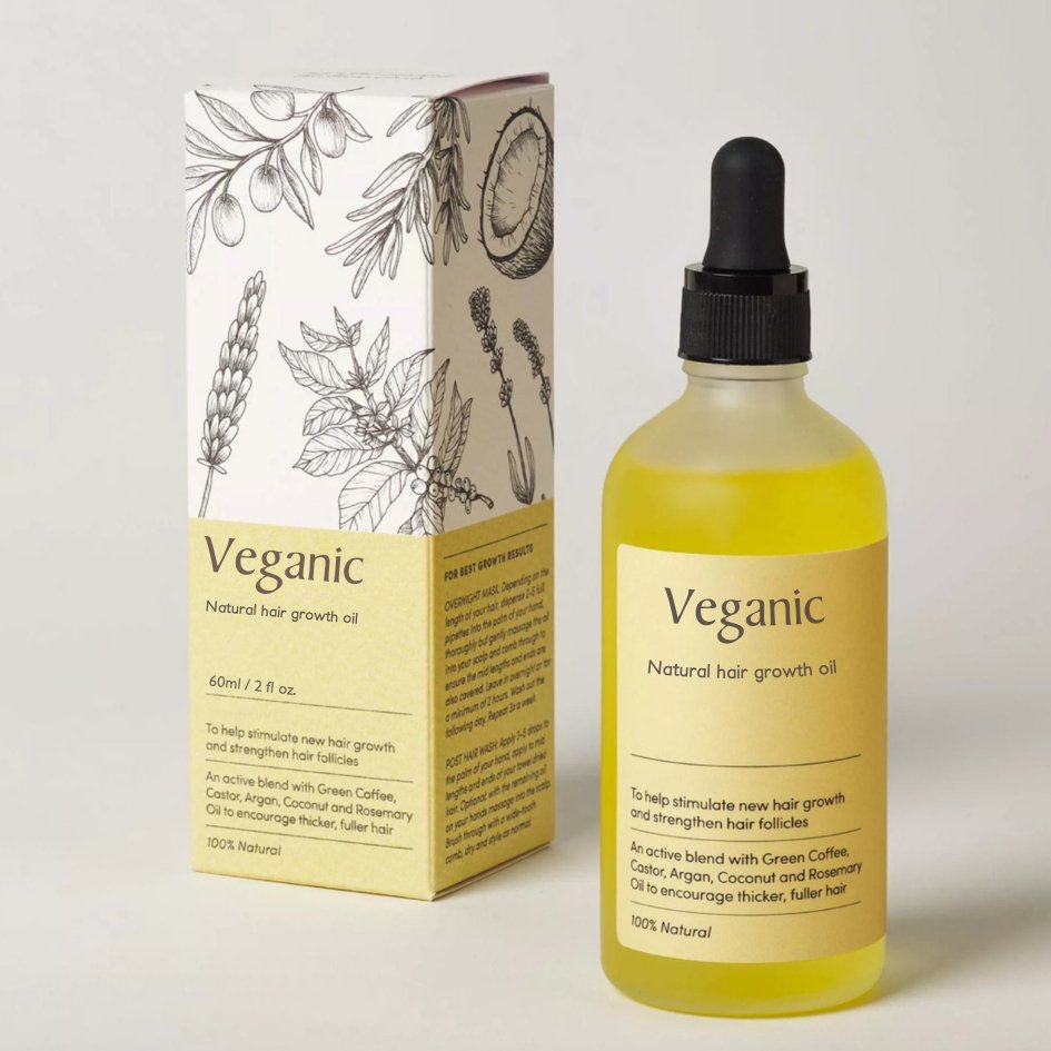 Natural Hair Growth Oil bottle, rich amber color, promises thicker hair with its 100% natural plant-based formulation.