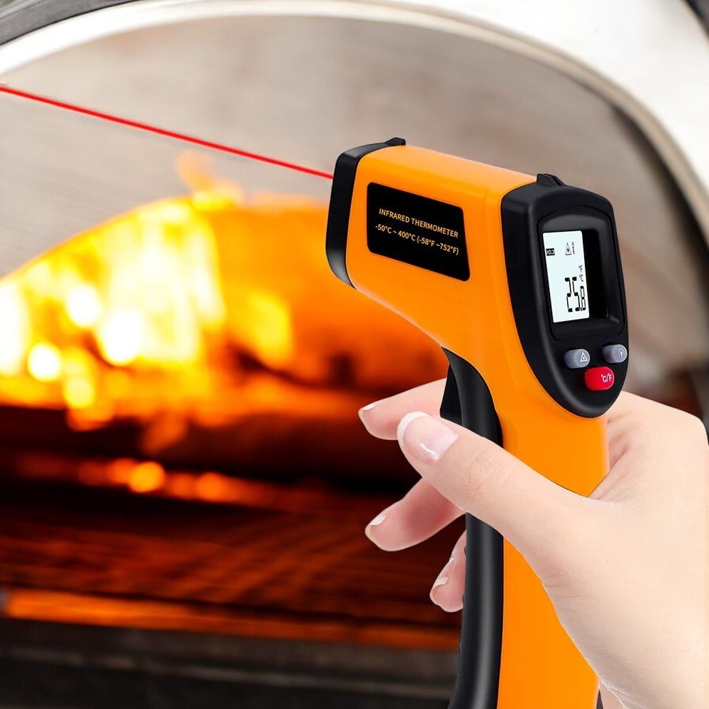 Non-contact infrared thermometer with laser targeting and backlit display for precise industrial temperature measurement.