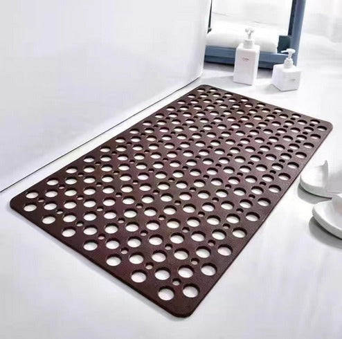 Non-slip shower mat with suction cups, textured for comfort, mold-resistant, in blue, green, grey; enhances bathroom safety.
