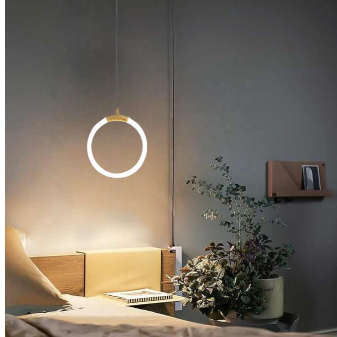 "Nordic LED Pendant Light with sleek metal lines and minimalist design, perfect for modern kitchens and dining areas."