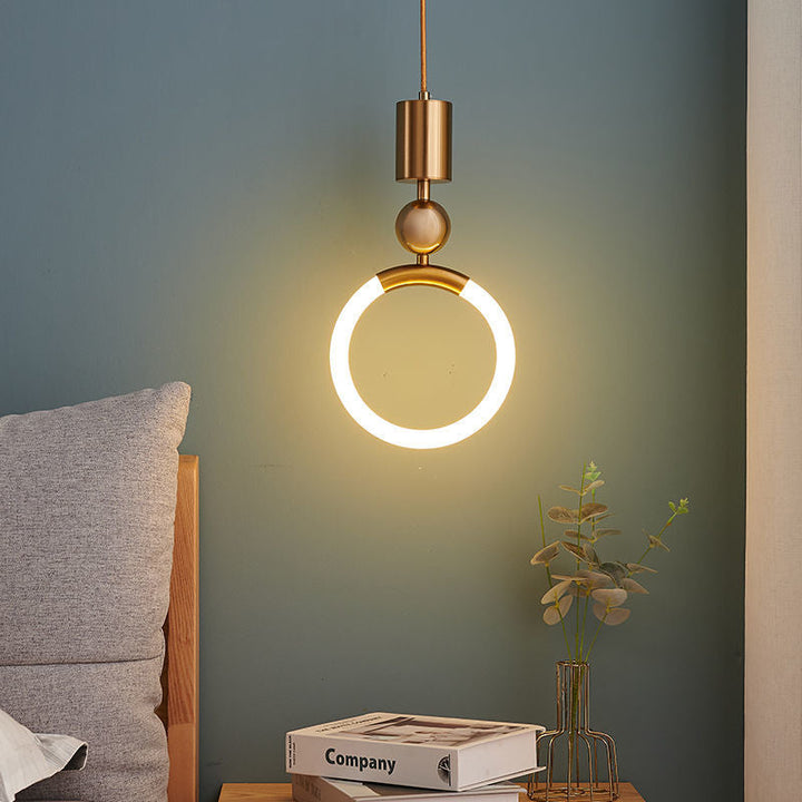 "Nordic LED Pendant Light with sleek metal lines and minimalist design, perfect for modern kitchens and dining areas."