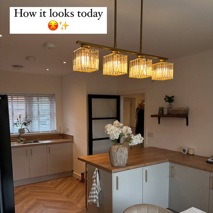 "Nordic multi-light glass pendant lamp with elegant glass shades, perfect for kitchen island or dining area centerpiece."