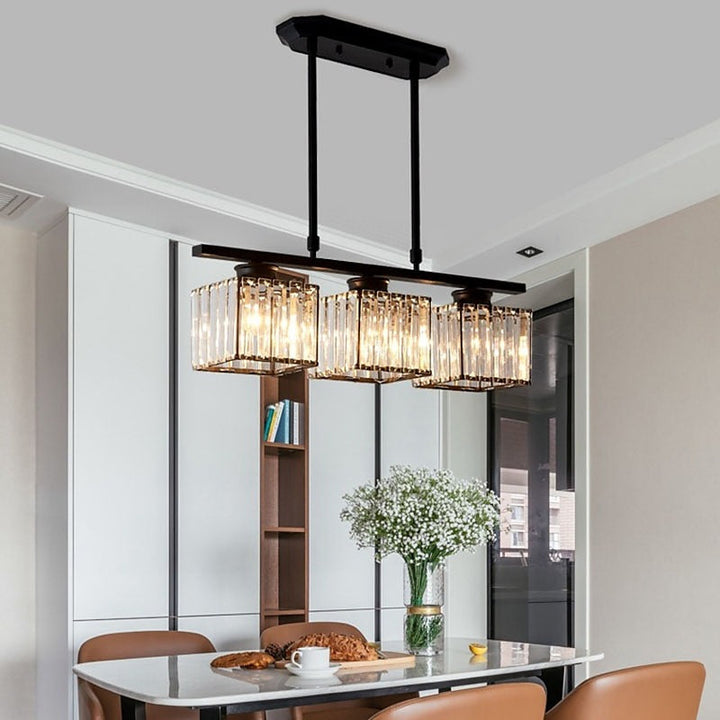 "Nordic multi-light glass pendant lamp with elegant glass shades, perfect for kitchen island or dining area centerpiece."