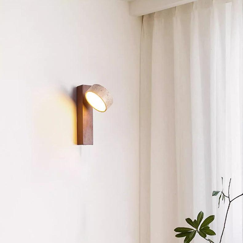 "Off-white travertine wall lamp with LED light, minimalist design, wood accents, ideal for ambient bedroom lighting."