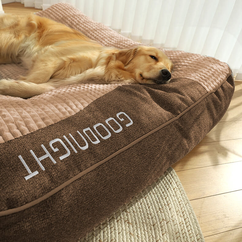 Gray orthopedic dog cushion designed for large dogs. Offers superior neck & spine support; comes with washable cover.