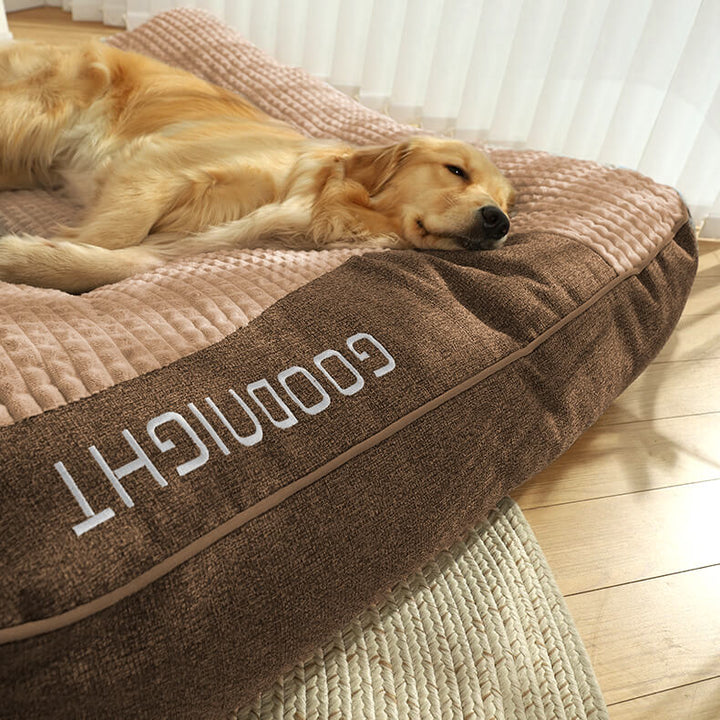 Gray orthopedic dog cushion designed for large dogs. Offers superior neck & spine support; comes with washable cover.