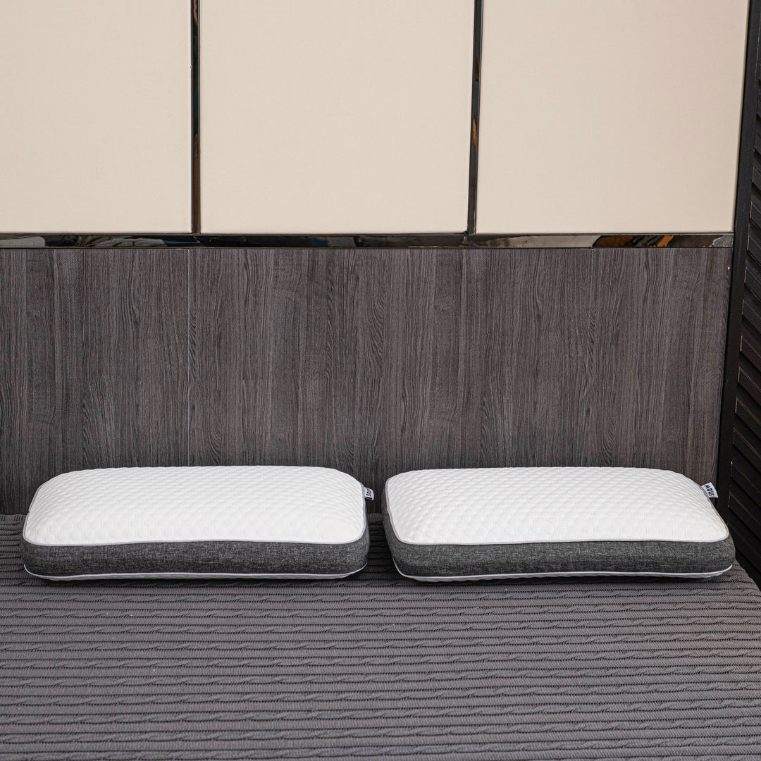 Orthopedic memory foam pillow offering pain-free sleep with ergonomic design and breathable cover for all sleep positions.