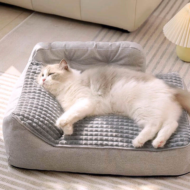 "Orthopedic pet bed with supportive terylene fabric, thick base, built-in pillow, ideal for joint comfort, non-slip design."
