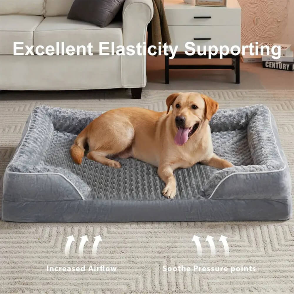 Orthopedic waterproof dog bed with thick foam base, raised edges, and plush cover for ultimate joint support and comfort.