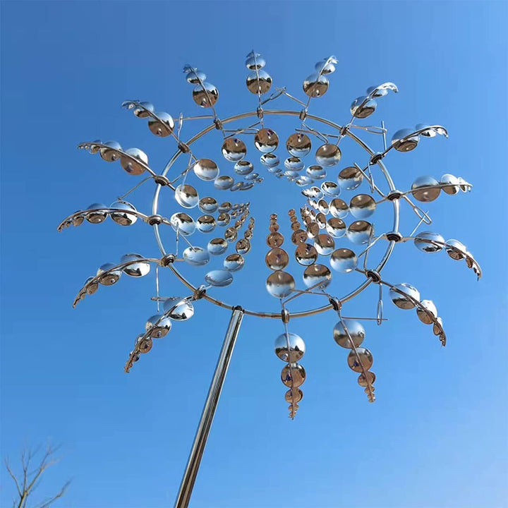 Outdoor anti-rust kinetic metal wind spinner with elegant wings, adds motion and charm to garden, perfect for year-round deco