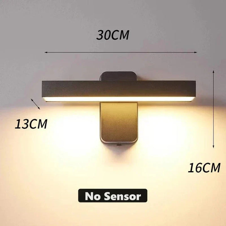 "Outdoor PIR motion sensor wall light, black aluminium, IP65 waterproof, rotatable design, warm white glow, modern style."