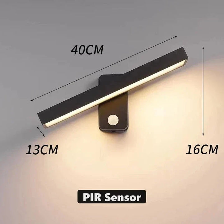 "Outdoor PIR motion sensor wall light, black aluminium, IP65 waterproof, rotatable design, warm white glow, modern style."