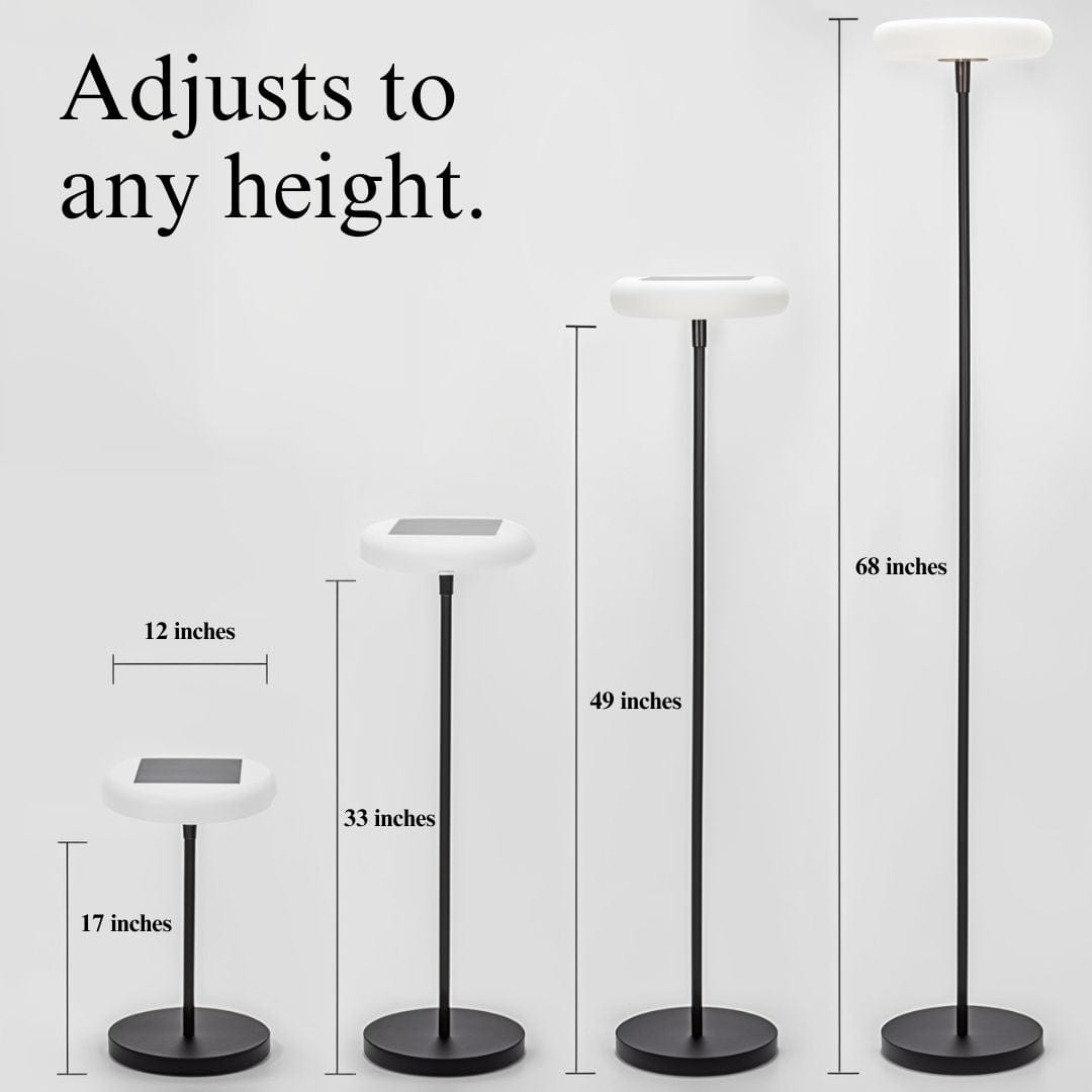 Outdoor solar floor lamp with metal and acrylic body, modern design, stands on patio illuminating with warm LED glow.
