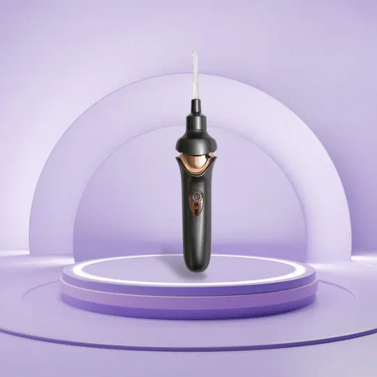 Modern white earwax vacuum cleaner with multiple soft tips, designed for effective & gentle ear cleaning.