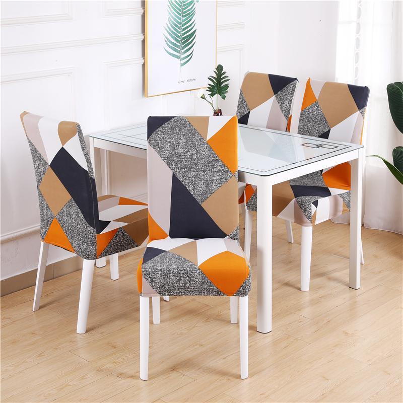 Patterned prismatic chair cover enhancing elegance; high-elasticity, anti-slip, durable fabric for stylish home décor.