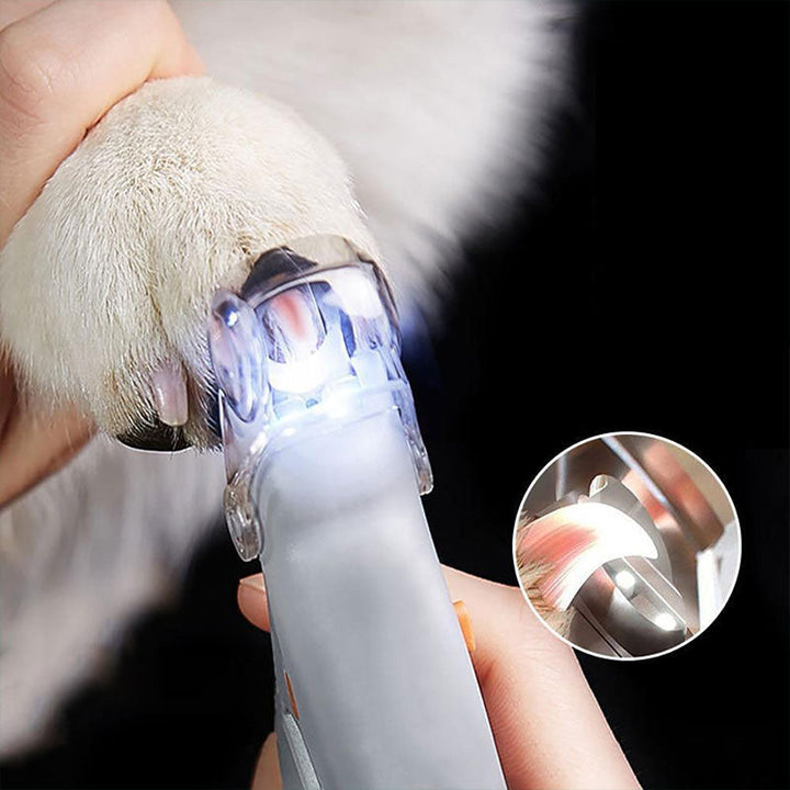 "Pet nail clipper with LED light, stainless steel blade, protective sensor for safe, precise dog and cat nail grooming."