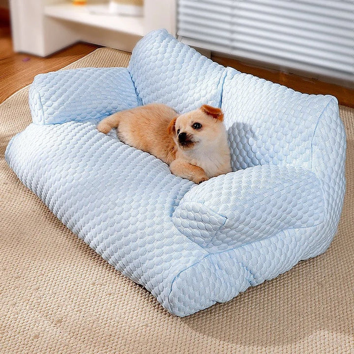 "PetChill Cooling Couch with ice silk fabric, ergonomic pet bed in soft hues, breathable design, perfect for hot days."