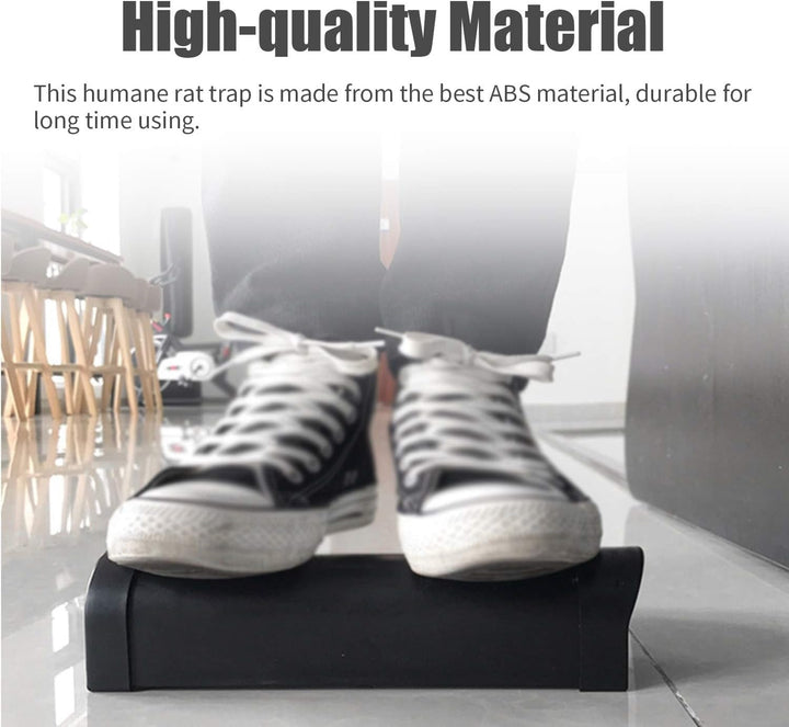 "Plastic rat trap cage with bionic design, sleek black finish, humane no-kill, efficient pest control, easy to use and clean.