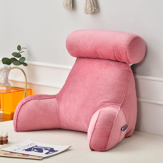 "Plush backrest pillow with arms, adjustable headrest, soft velour cover, ergonomic design for neck and back support."