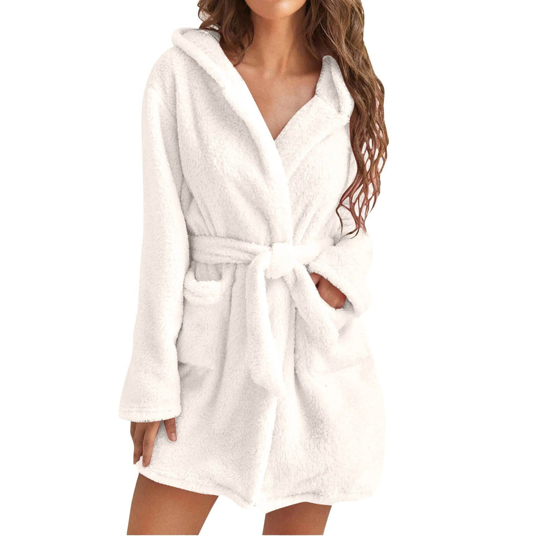 Warm coral fleece hooded bathrobe, a cozy women's plush robe for winter.