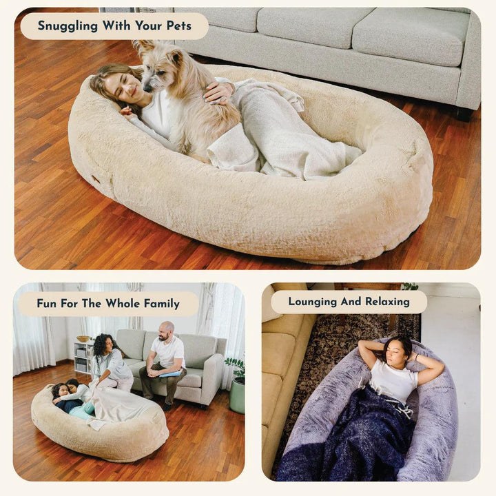 "Plush oversized lounger for pets and owners, featuring gray memory foam and plush bolsters for ultimate comfort and style."