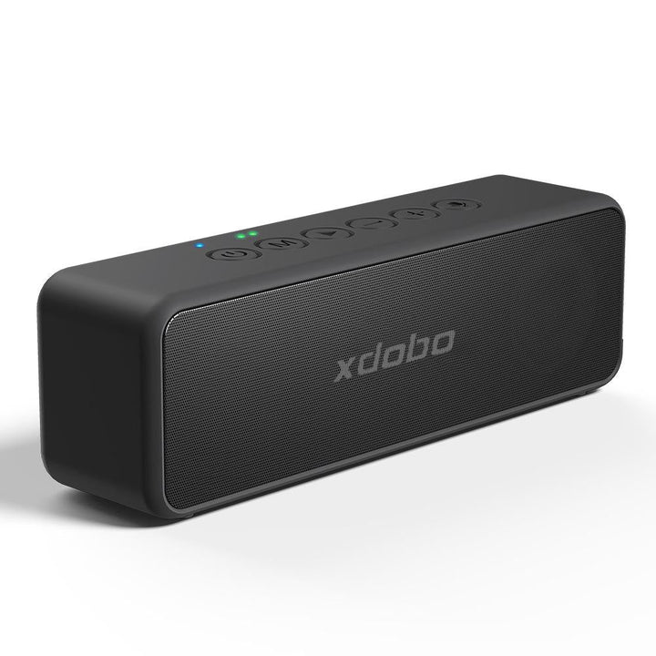 "Portable black waterproof 30W Bluetooth speaker with 4000mAh battery, dual drivers, compact for outdoor use."