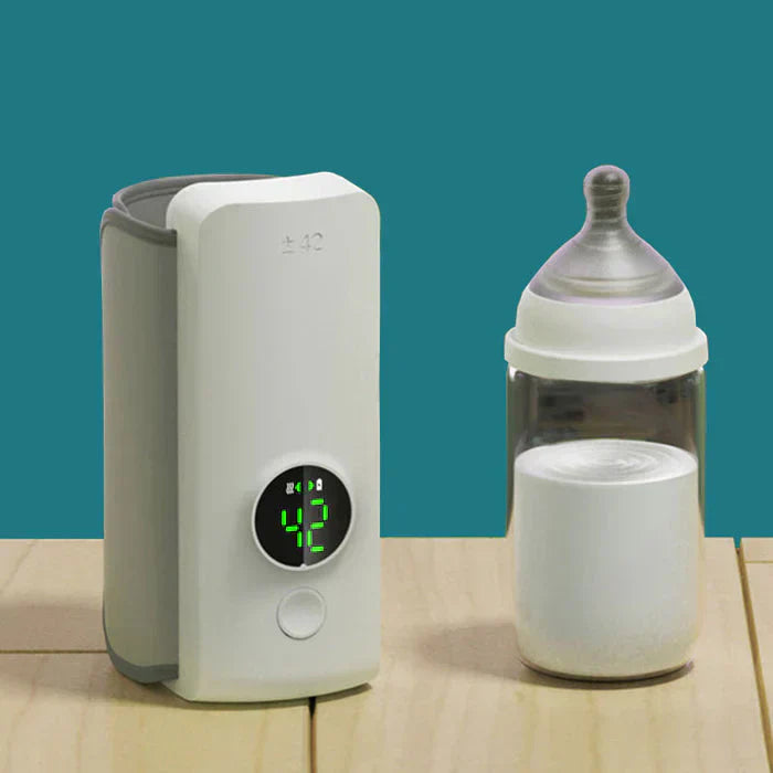 "Portable rechargeable baby bottle warmer with digital display, compact design, BPA-free, USB charging, perfect temperature."
