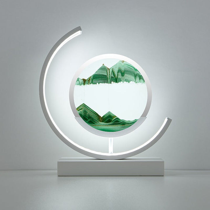 Quicksand art table lamp with rotating sand patterns, 360-degree rotation, elegant design, soft LED light, stress relief.