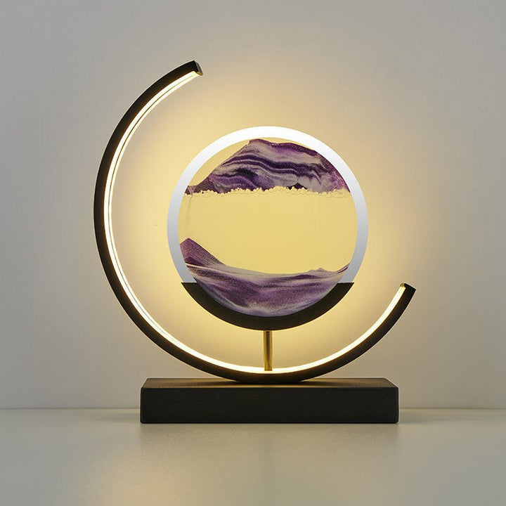 Quicksand art table lamp with rotating sand patterns, 360-degree rotation, elegant design, soft LED light, stress relief.