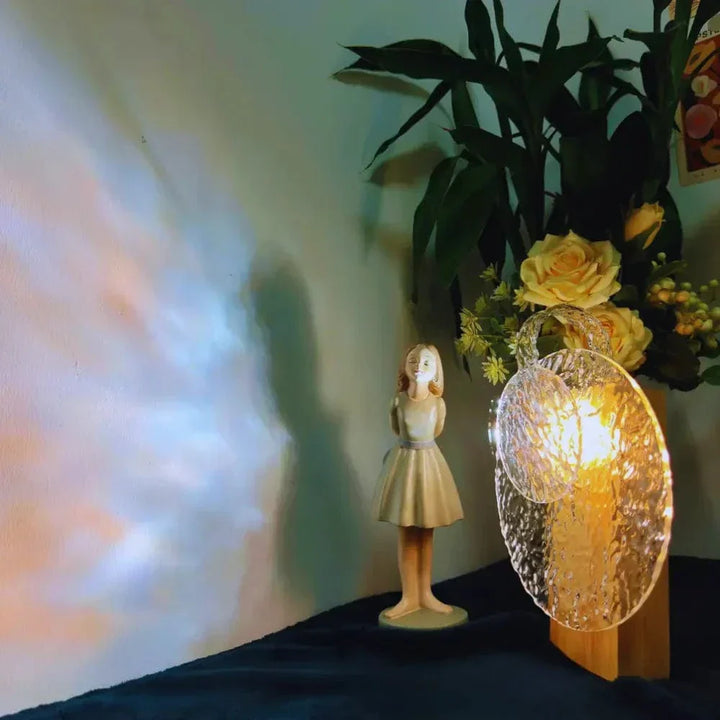 "Rechargeable LED lamp projects sunset hues, ocean waves; adds cozy ambiance to home decor with adjustable head."