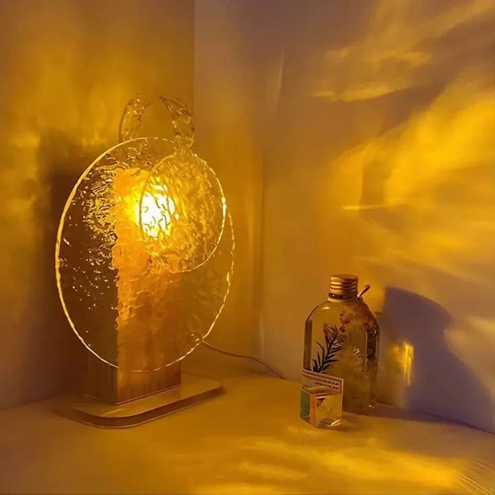 "Rechargeable LED lamp projects sunset hues, ocean waves; adds cozy ambiance to home decor with adjustable head."